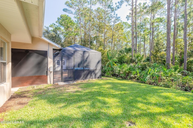 5452 Saint Regis Way, Port Orange, FL 32128 - view of grassy yard with a jacuzzi