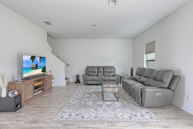 living room with light hardwood / wood-style floors