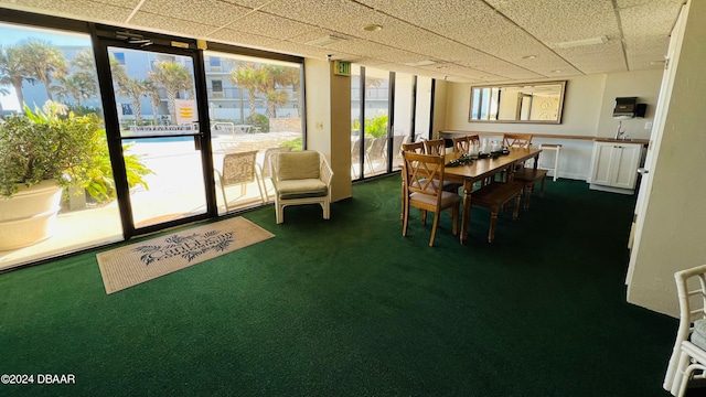 sunroom with a drop ceiling