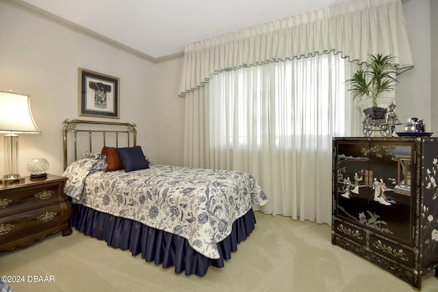 2425 S Atlantic Ave Unit 1403, Daytona Beach, FL 32118 - carpeted bedroom with ornamental molding