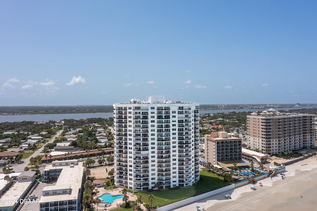 2425 S Atlantic Ave Unit 1403, Daytona Beach, FL 32118 - bird's eye view of a pool, a large body of water, and apartment complex / building
