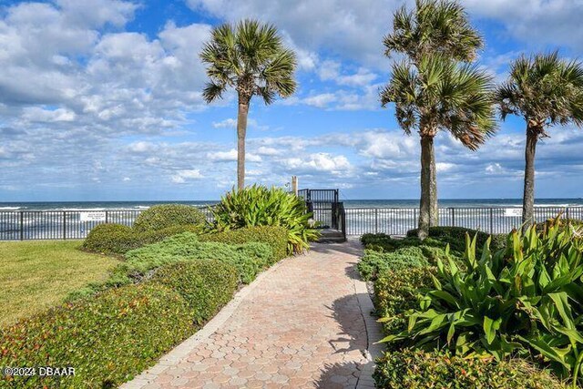 exterior space with a water view