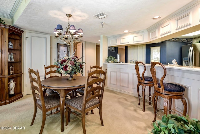 carpeted dining space featuring a textured ceiling, a notable chandelier, and crown molding