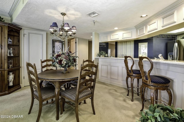 2425 S Atlantic Ave Unit 1403, Daytona Beach, FL 32118 - dining space featuring light colored carpet, a chandelier, a textured ceiling, and recessed lighting