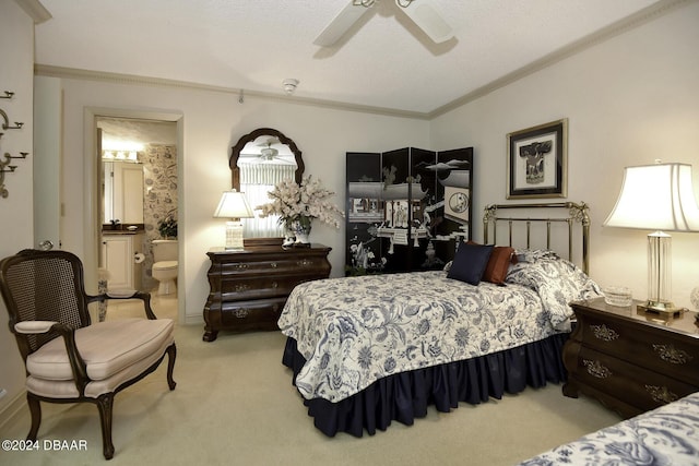 2425 S Atlantic Ave Unit 1403, Daytona Beach, FL 32118 - carpeted bedroom with crown molding, ceiling fan, and ensuite bathroom