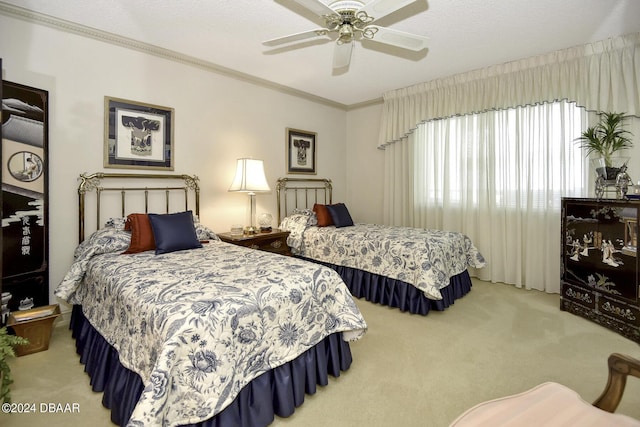 2425 S Atlantic Ave Unit 1403, Daytona Beach, FL 32118 - carpeted bedroom with ornamental molding and a ceiling fan