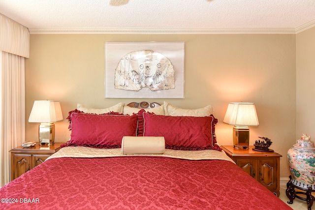 carpeted bedroom featuring a textured ceiling and ornamental molding