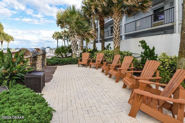 view of patio / terrace with a balcony