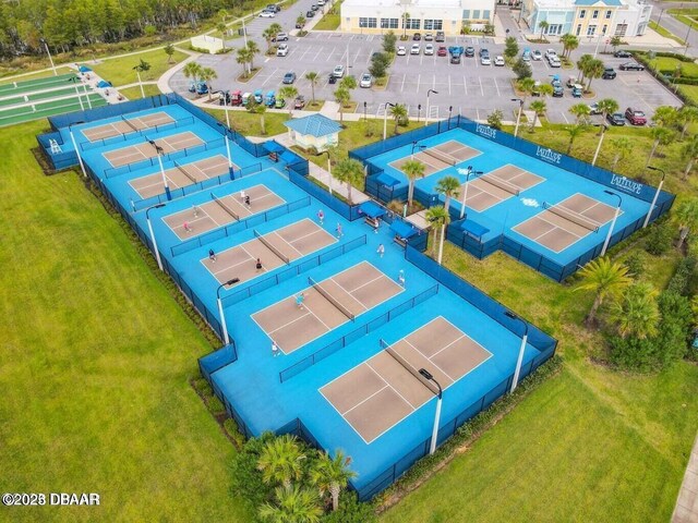 view of sport court with a water view