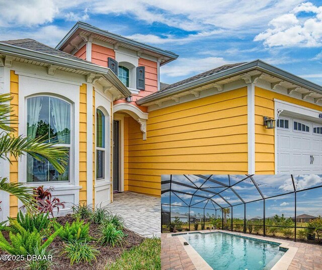 484 Tropics Ave, Daytona Beach, FL 32124 - exterior space featuring a garage, glass enclosure, and a patio area