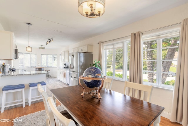 dining room featuring light hardwood / wood-style floors