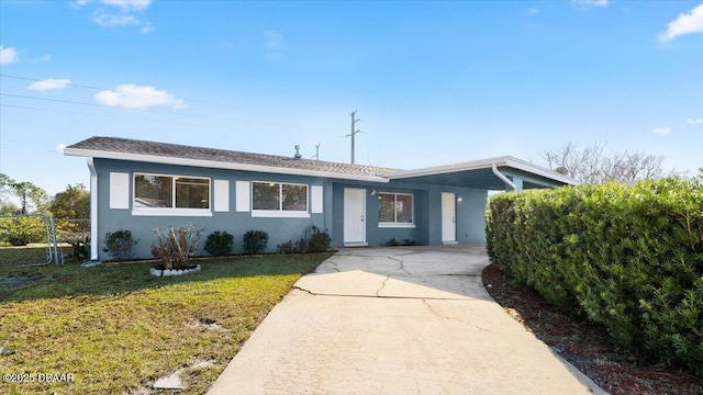 ranch-style home with a front yard