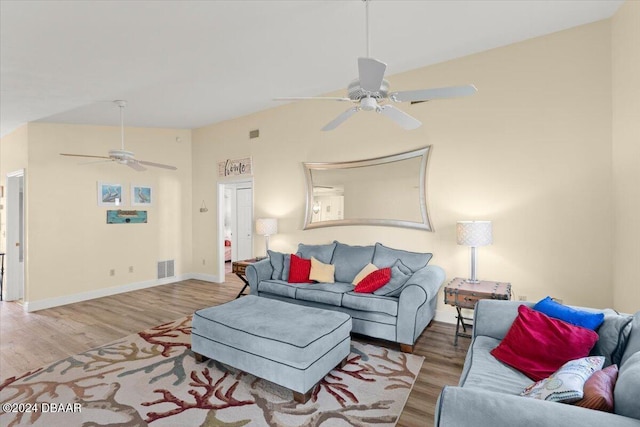 living room with hardwood / wood-style flooring and ceiling fan