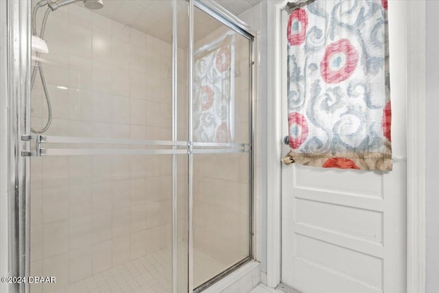 bathroom featuring an enclosed shower