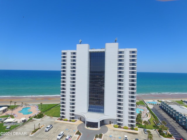 exterior space with a view of the beach and a water view