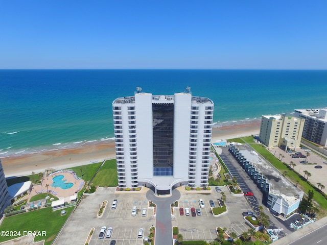 drone / aerial view with a view of the beach and a water view