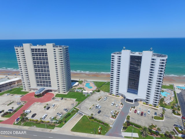 aerial view with a beach view and a water view