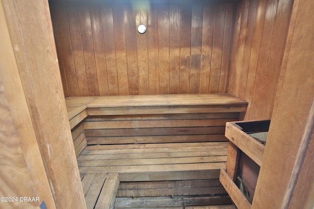 view of sauna / steam room with wooden walls