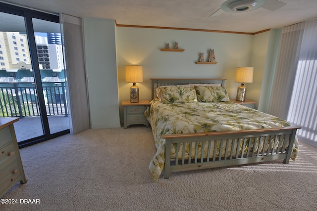 bedroom featuring access to exterior, light colored carpet, ceiling fan, and crown molding