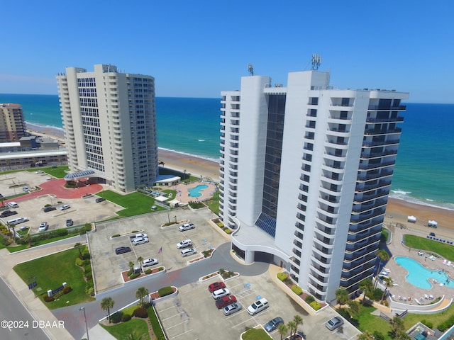 drone / aerial view with a view of the beach and a water view