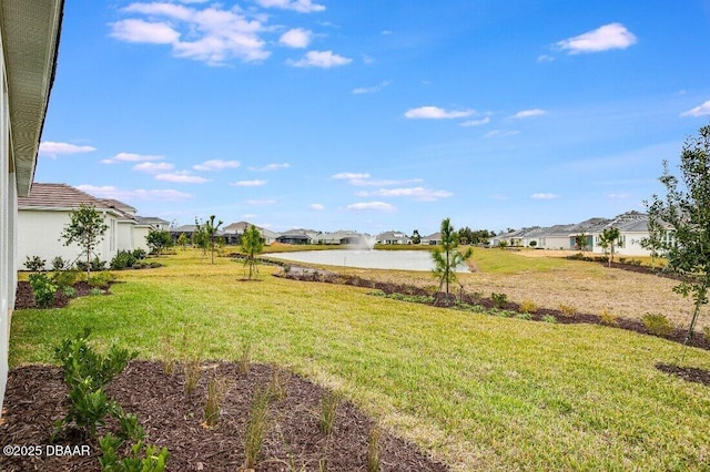 view of yard featuring a water view