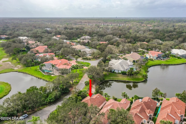 drone / aerial view featuring a water view