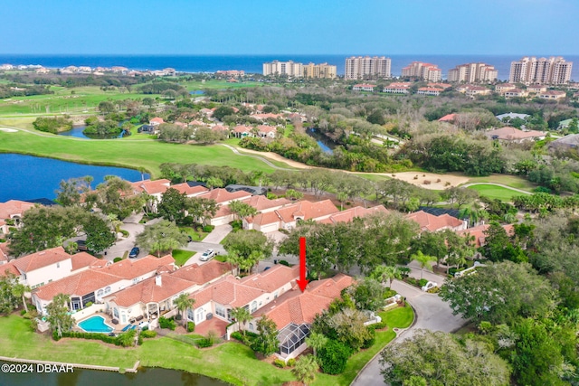 birds eye view of property featuring a water view