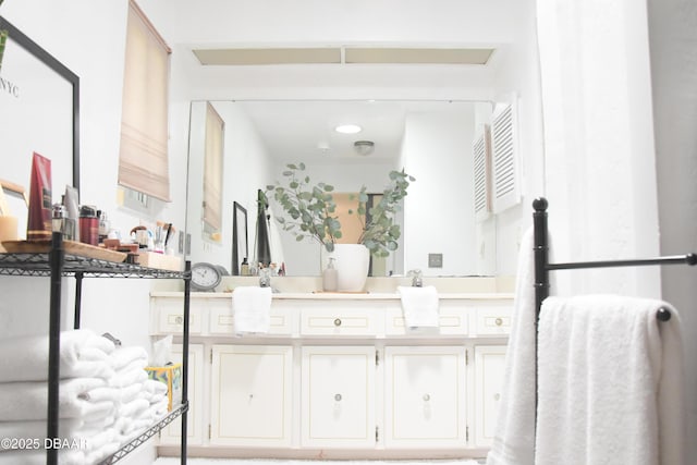 bathroom featuring double vanity