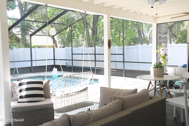 view of pool featuring an outdoor hangout area, a fenced backyard, a ceiling fan, and a patio