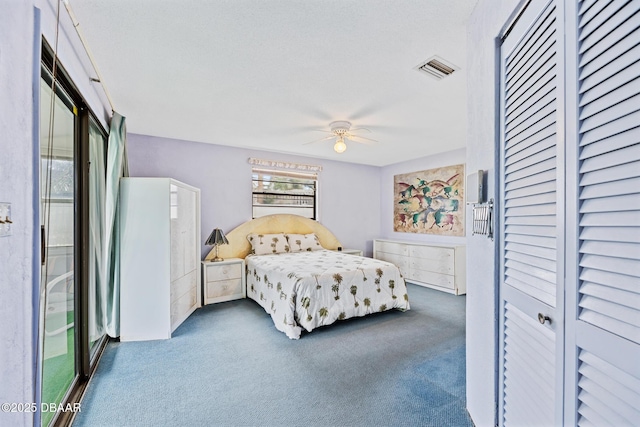 bedroom with ceiling fan and carpet