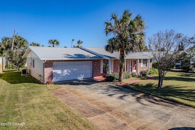 single story home featuring a front yard, a garage, and central AC