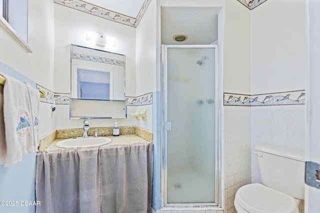 bathroom featuring sink, tile walls, toilet, and walk in shower