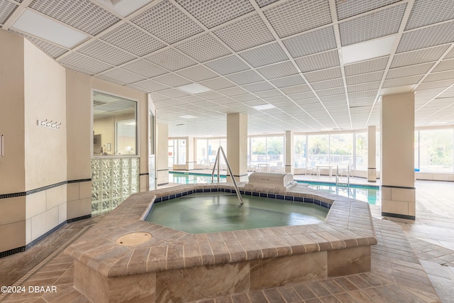 view of pool with an indoor in ground hot tub