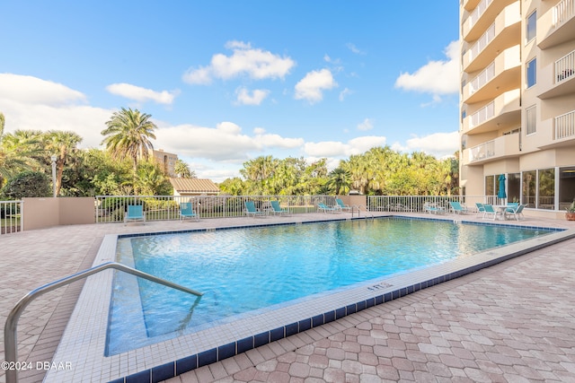 view of pool featuring a patio