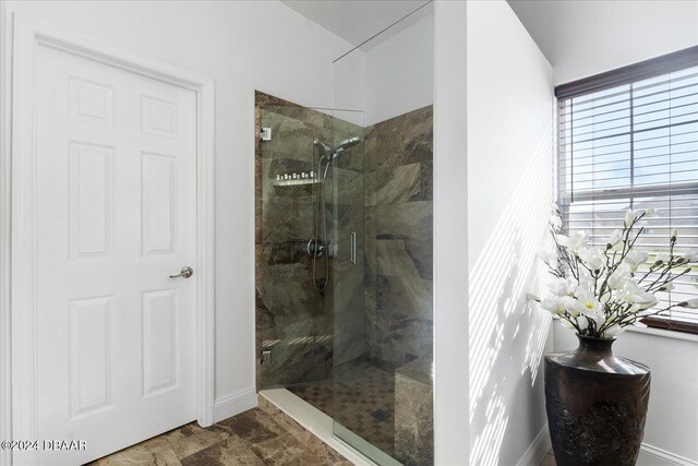 bathroom featuring walk in shower