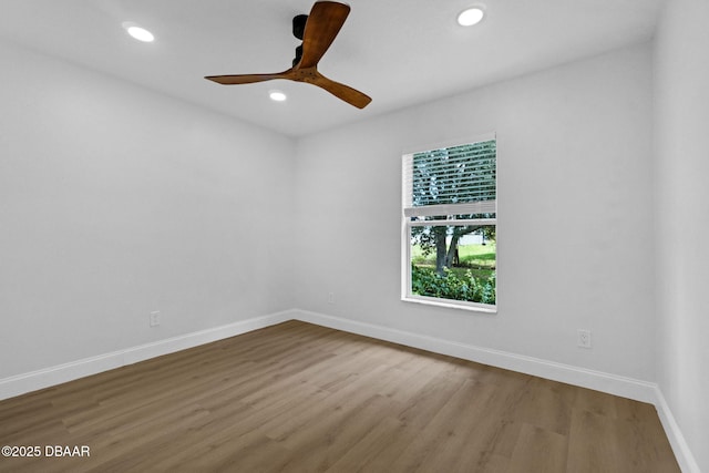 969 Commerce Rd SE Se, Unit Se, Palm Bay, FL 32909 - empty room with wood finished floors, recessed lighting, and ceiling fan