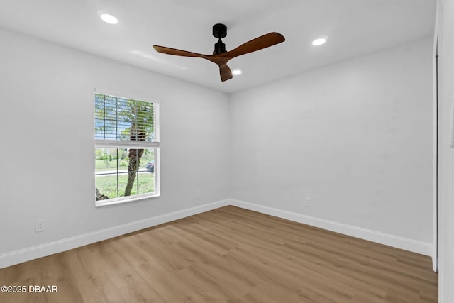 969 Commerce Rd SE Se, Unit Se, Palm Bay, FL 32909 - unfurnished room with ceiling fan, light wood finished floors, and recessed lighting