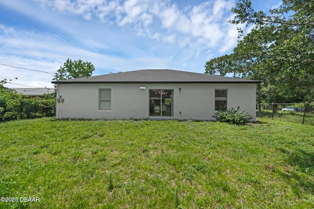 969 Commerce Rd SE Se, Unit Se, Palm Bay, FL 32909 - rear view of property with stucco siding