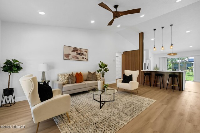 969 Commerce Rd SE Se, Unit Se, Palm Bay, FL 32909 - living room with a ceiling fan, vaulted ceiling, light wood-style flooring, and recessed lighting