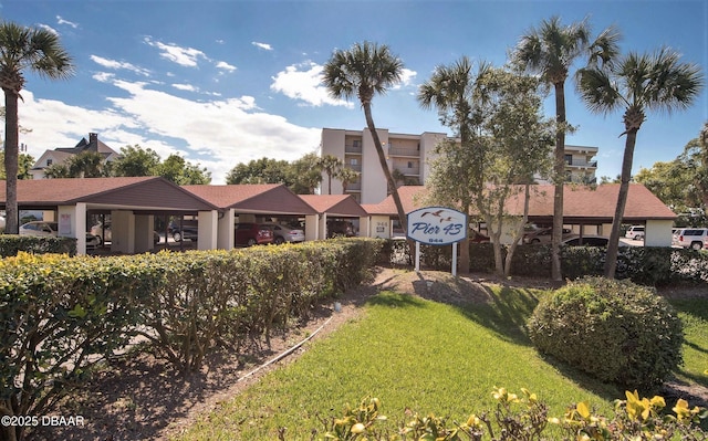 944 S Peninsula Dr Unit 104, Daytona Beach, FL 32118 - view of home's community with a yard