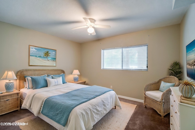 944 S Peninsula Dr Unit 104, Daytona Beach, FL 32118 - bedroom with dark carpet, baseboards, and ceiling fan