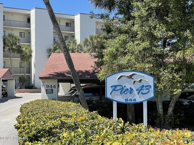 944 S Peninsula Dr Unit 104, Daytona Beach, FL 32118 - exterior view of stucco siding
