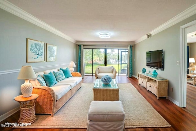 944 S Peninsula Dr Unit 104, Daytona Beach, FL 32118 - living area with crown molding, dark wood-type flooring, baseboards, and a baseboard radiator