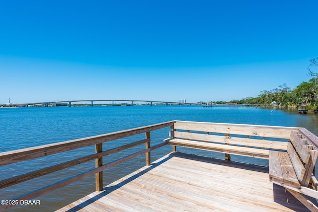 944 S Peninsula Dr Unit 104, Daytona Beach, FL 32118 - dock area featuring a water view