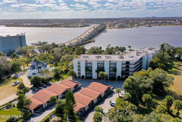 944 S Peninsula Dr Unit 104, Daytona Beach, FL 32118 - drone / aerial view of a large body of water and a notable bridge