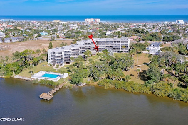 944 S Peninsula Dr Unit 104, Daytona Beach, FL 32118 - aerial view of property's location with a nearby body of water and a pool area