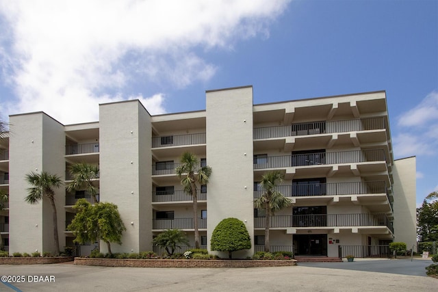 944 S Peninsula Dr Unit 104, Daytona Beach, FL 32118 - view of apartment building / complex
