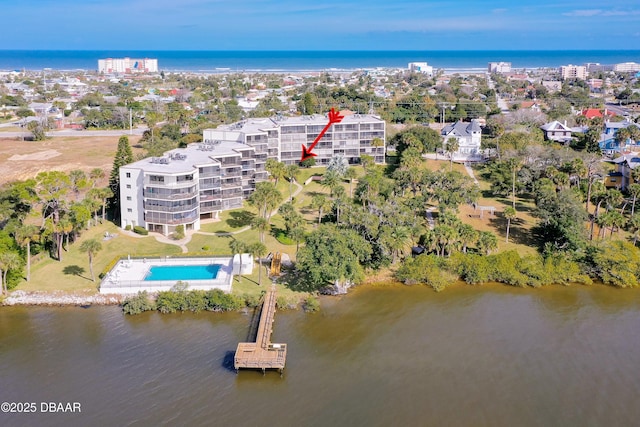 944 S Peninsula Dr Unit 104, Daytona Beach, FL 32118 - aerial overview of property's location with a large body of water and a pool