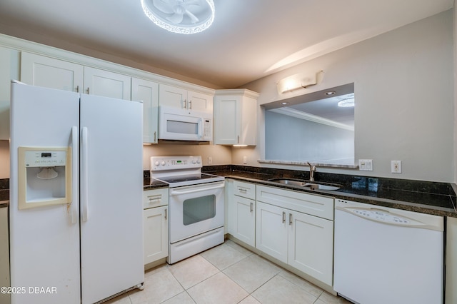 944 S Peninsula Dr Unit 104, Daytona Beach, FL 32118 - kitchen featuring white appliances, a sink, white cabinets, light tile patterned floors, and ornamental molding