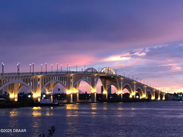 944 S Peninsula Dr Unit 104, Daytona Beach, FL 32118 - water view with a notable bridge